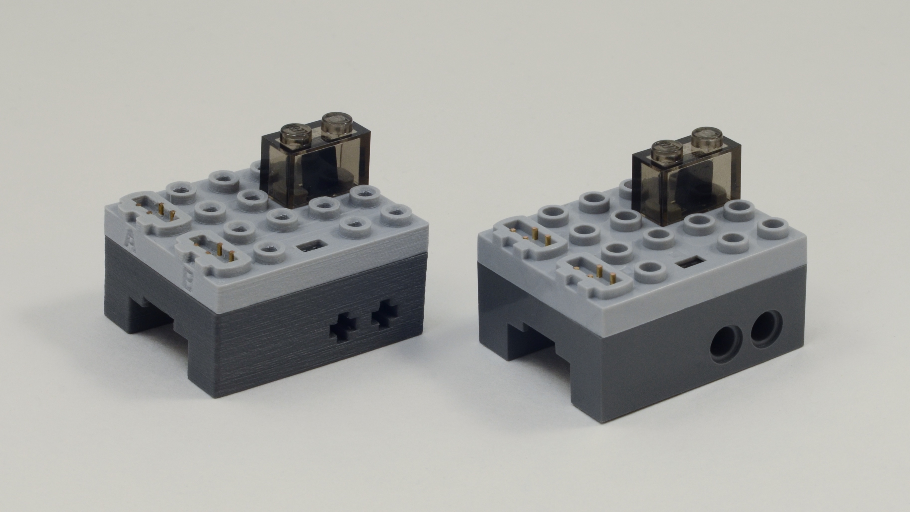 1st generation 3D printed PFx Brick (left) new 2nd generation PFx Brick (right) injected molded in ABS